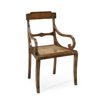 Regency walnut scroll armed chair with caned seat