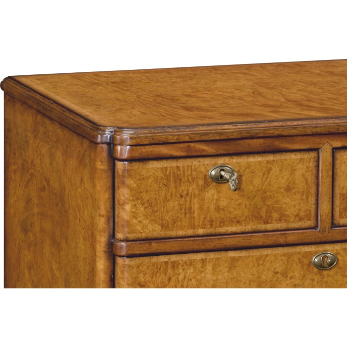 Bow front walnut chest of six drawers
