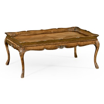 Rectangular satinwood coffee table with carved raised top