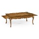 Rectangular satinwood coffee table with carved raised top