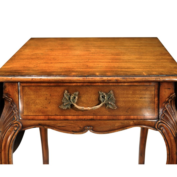 Carved walnut pembroke table