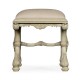 Heavily carved French provincial green x-frame footstool