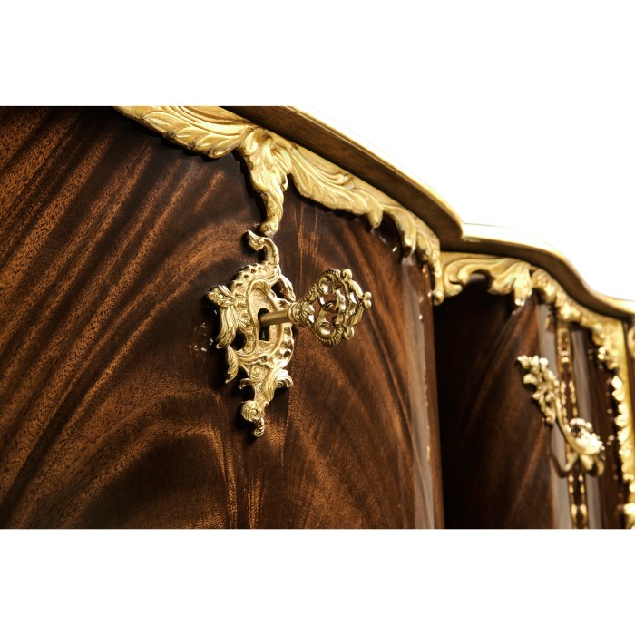 Mahogany chest of drawer with gilded
