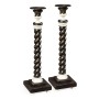 A Pair of Charcoal & Faux Bone Candlesticks